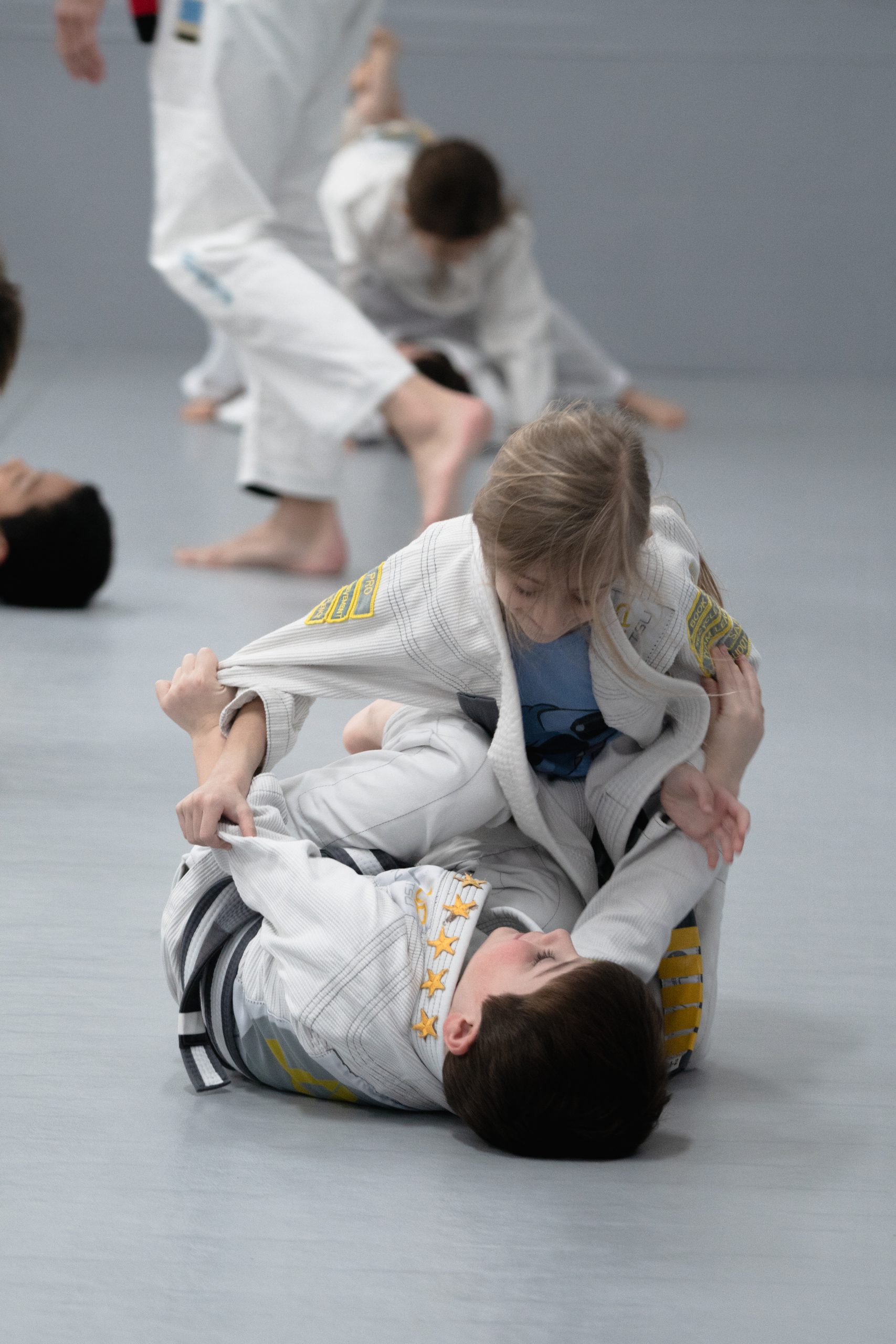 Kids practising Brazilian Jiu-Jitsu